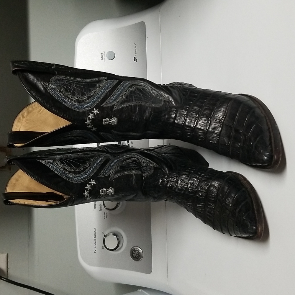 Black caiman cowboy boots.